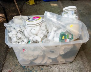 Large Tote of PVC Plumbing Fittings