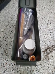 Ammo Box With Gun Cleaning Supplies