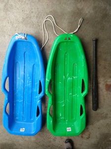 (2) Plastic Sleds & Old Baseball Bat
