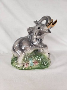 Ceramic Elephant Figurine with Gold Colored Tusks