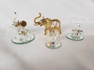 Glass and Metal Elephant Figurines Including Heart Display and Purple Rose Decoration