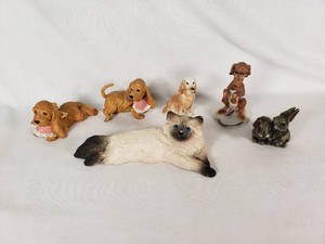 Porcelain and Resin Animal Figurines including Cat, Dogs, and Rabbits