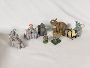 Elephant Figurine Collection including some with floral and decorative elements