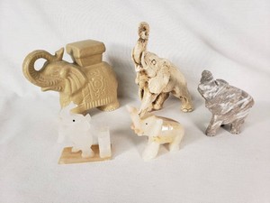 Elephant Figurines Including Ceramic, Marble, and Stone Pieces