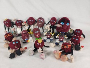California Raisins Figurine Lot including plush and plastic characters, band setup, and accessories