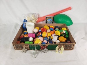 Mixed toy lot including Fisher-Price People and Irwin Corp items, plastic soldiers, and novelty toys