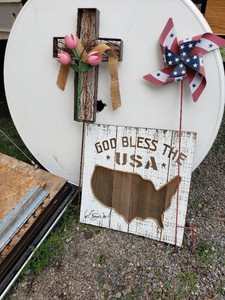 Cross and Pinwheel Stakes and USA Sign