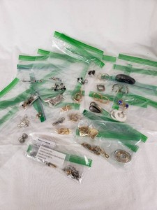 Variety of Earrings and Jewelry Accessories in Bags