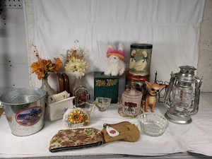 Decorative Home and Garden Items including Lantern, Faux Flowers, and Figurines