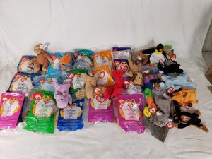 Ty Beanie Babies and Teenie Beanie Babies Lot, including McDonalds, Claude the Crab, Doby the Doberman, and Spunky the Dog
