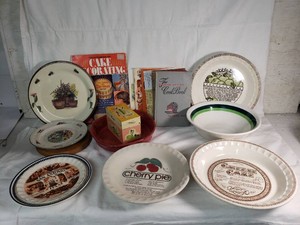 Vintage Kitchen and Cookware Collection with Cookbooks and Plates
