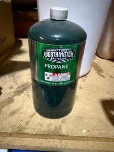 Garbage Can & 3 Propane Cans