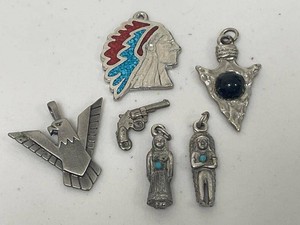 Lot Including Southwestern Style Pendants Eagle Chief Arrowhead Gun Charms