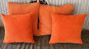 P - Four Orange Throw Pillows