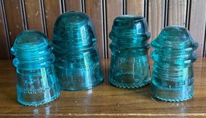 LR - Four Vintage Blue Glass Insulators