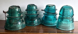 LR - Four Vintage Blue Glass Insulators