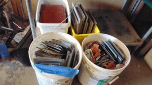 2- Pails of Snaplock Bearing Plates and 2 -Pails of Other Building Supplies