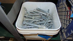 Bucket of Large Sized Cement Anchors