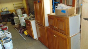 Lot of Various Oak Front Cupboards, Great for Garage of Laundry Room (contents not included on top of cabinets)
