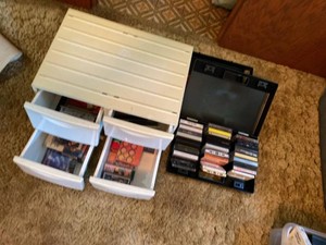Box Lot of Assorted Cassette Tapes CDs & Plastic Media Storage Cases