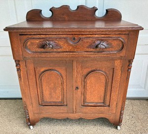 Antique Carved Two Drawer Two Door Washstand on Wheels