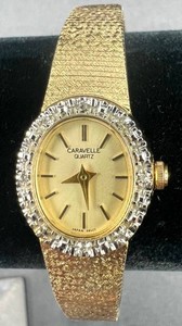 Vintage Caravelle by Bulova Womens Cocktail Watch - Textured Gold-Toned Bracelet with Crystal-Set Decorative Bezel