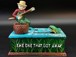 Vintage The One That Got Away Cast Iron Mechanical Coin Bank
