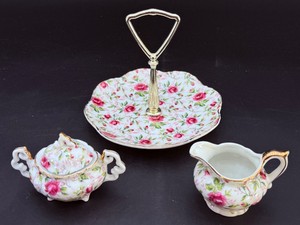 Up for auction is a beautiful, highly collectible 3-piece vintage porcelain serving set in the classic Rose Chintz pattern by Lefton China.