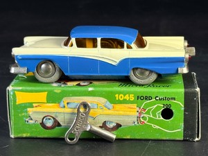 MINT Schuco 1045 Ford Custom 300 Diecast Micro Racer Wind-Up Toy Car-100% Complete With Original Box, Key, &amp; Paperwork Made in West Germany. Works Like New