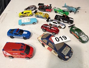 A lot of diecast cars, hot wheels and more