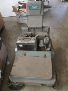 Battery powered floor sweeper, unte...