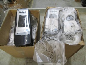11 Go Jo commercial dispensers...