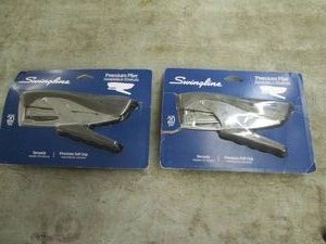 2 Swingline handheld staplers...