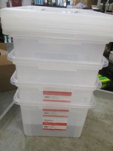 4 Staples file boxes, one lid is cr...