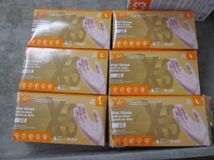 6 100 Count vinyl gloves...