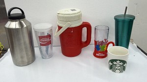 Large lot of Starbucks coffee mug, Starbucks cold drink glass, neon iced glass, Pizza Hut, thermos, Coca-Cola collector glass, and stainless steel Arctic thermos