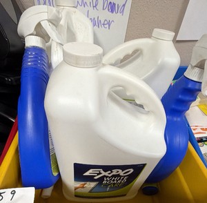 white board cleaner 1 full bottle 2 half full