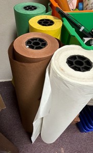 bulk rolls of paper, white, brown yellow green