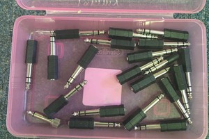 6.35mm (14 inch) male to 3.5mm (18 inch) female stereo audio jack adapters.
