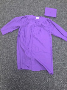 lot of kindergarten elementary school cap and gowns deep purple