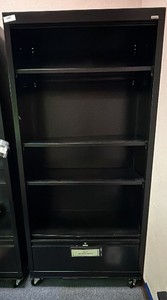Cabinet with one locking drawer with key