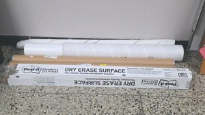 assortment of dry erase boards