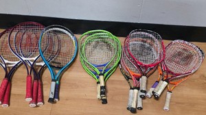 assortment of tennis rackets