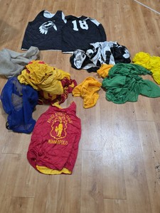 assortment of basketball uniforms