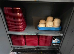 assortment of cafeteria supplies