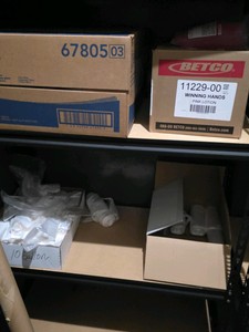 shelf of janitorial supplies