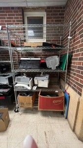assorted damaged or broken electronics the rack is not included