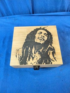 Bamboo wooden stash box featuring a pyrography (wood-burned) portrait of Bob Marley