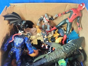 This lot features a variety of Marvel and DC action figures,