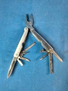 Winchester.stainless steel multi-tool features pliers as the main component